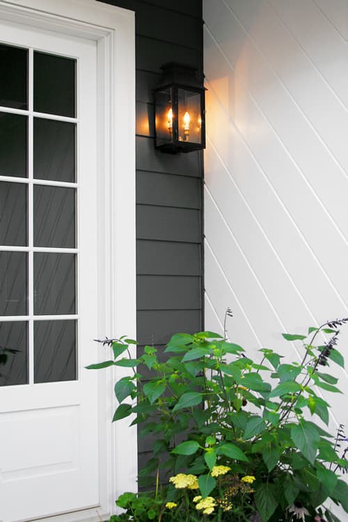 gray house with white door