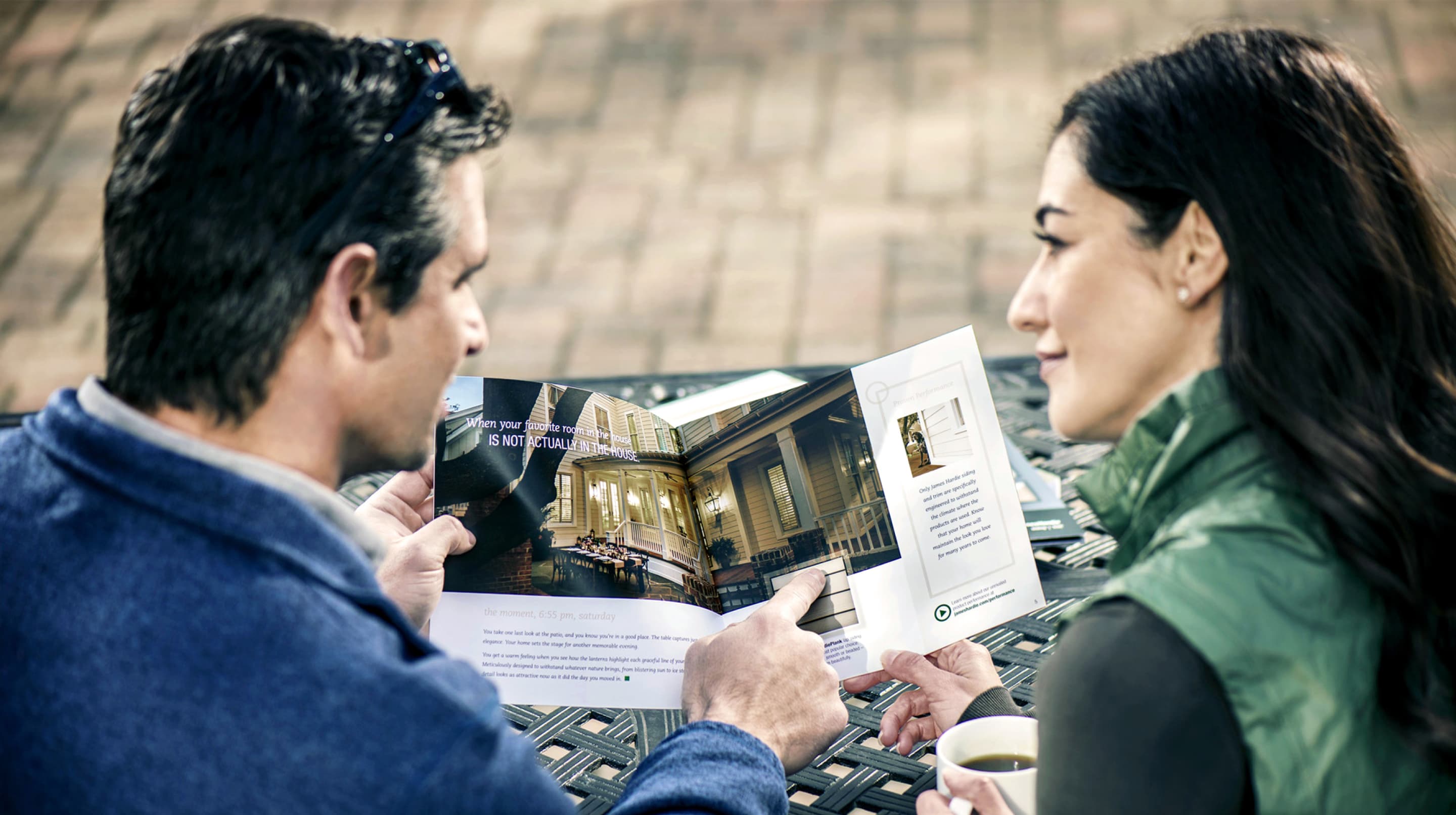 couple-reviewing-james-hardie-brochure couple-reviewing-james-hardie-brochure